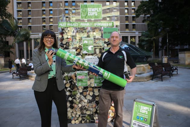 The coffee cups collected as part of the trial were on display at Wynyard Park, Sydney. City of Sydney Cr Jess Scully is pictured here with Brendan Lee of Closed Loop Environmental Solutions.